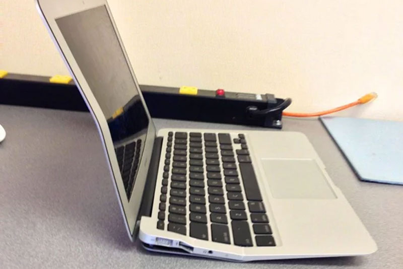 Macbook Air ran over by a busy mum